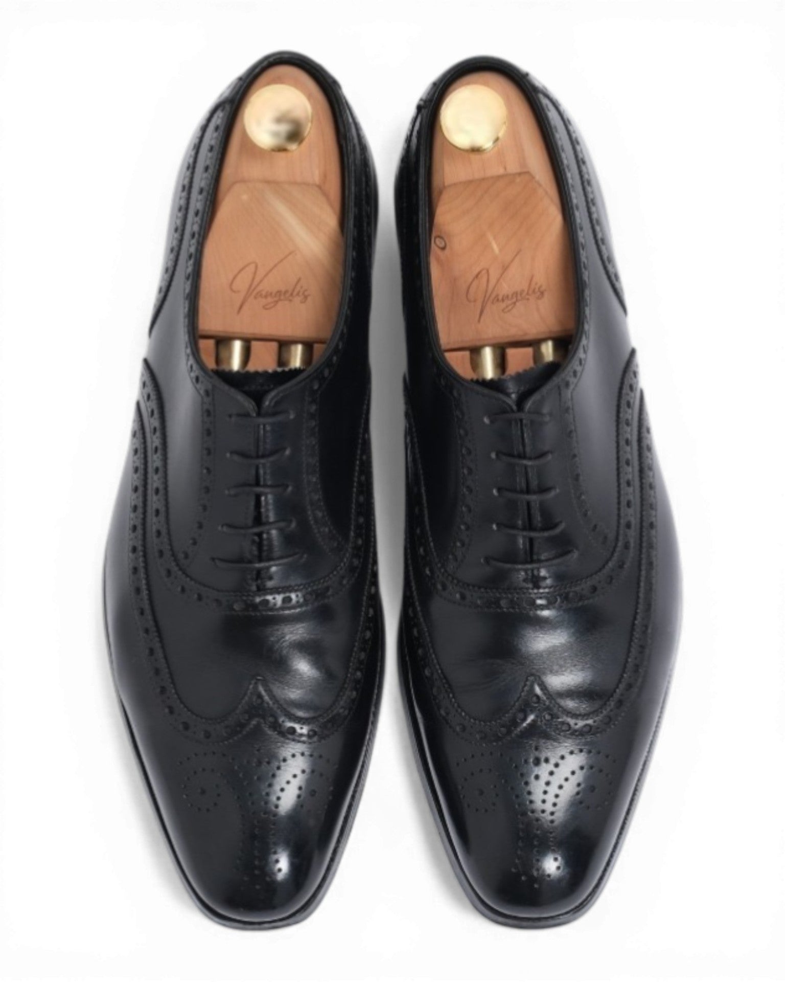 Black Leather Wing-Tip Oxfords