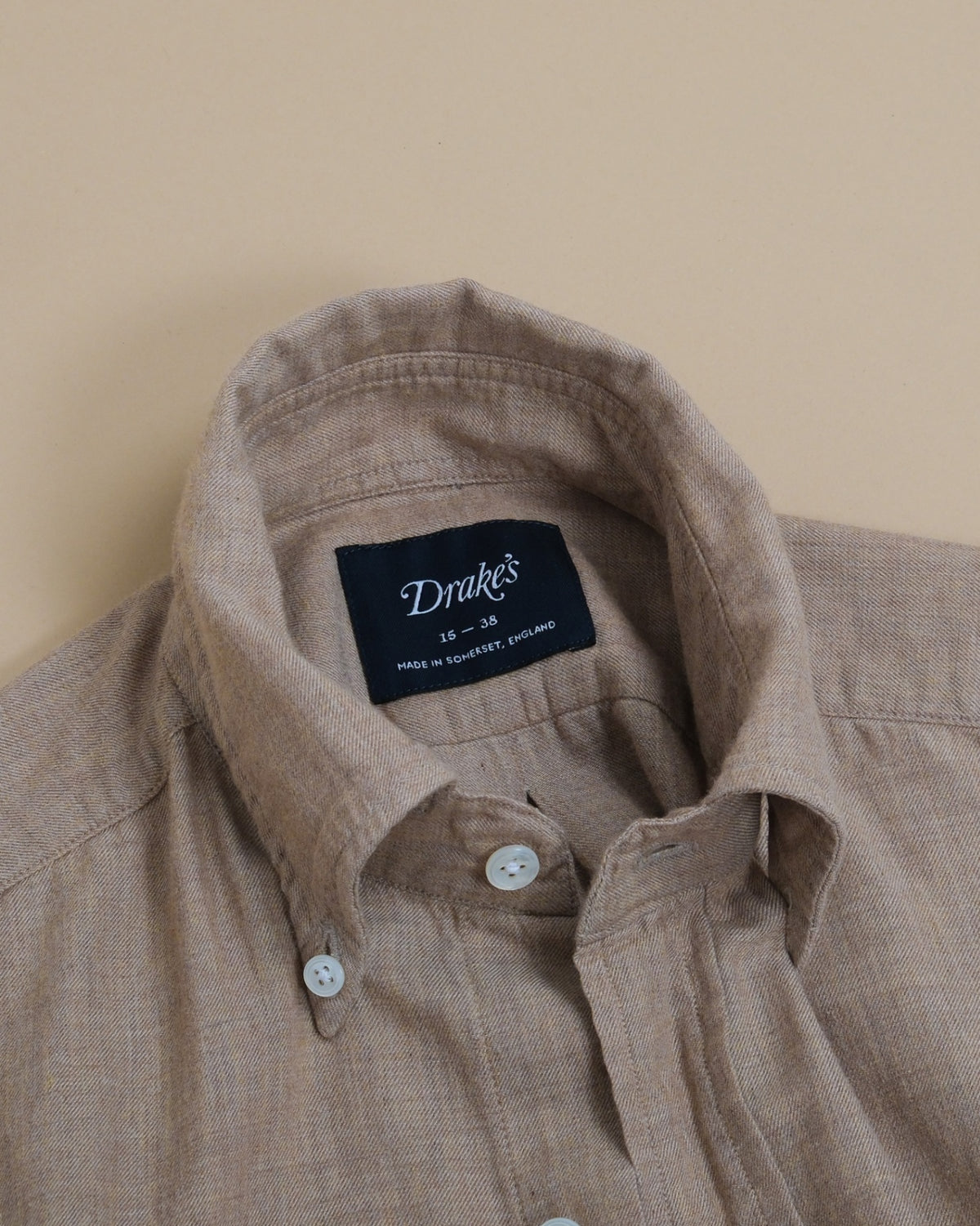 Detail of the rolling collar on Light Beige Cotton Flannel BD. Shirt by Drake's