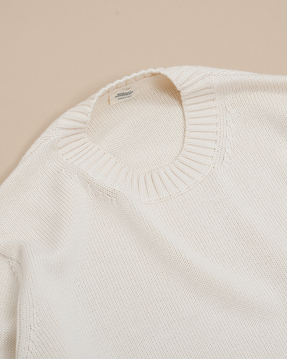 Detail of ribbed crewneck on Bone Nonpareil Heavy Crewneck by Rubato