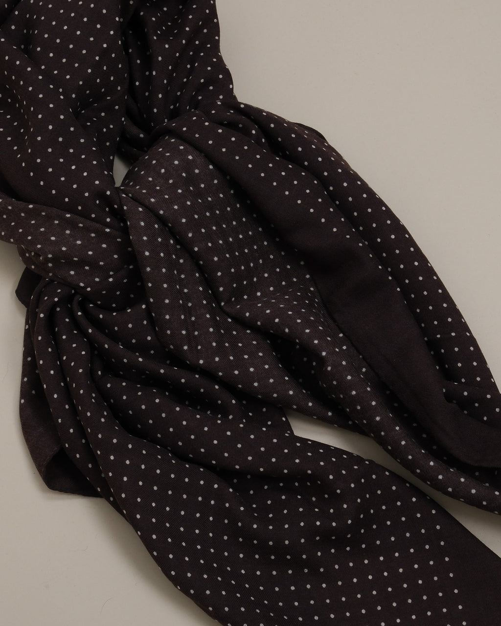 Detail of The Big Square scarf by Rubato tied