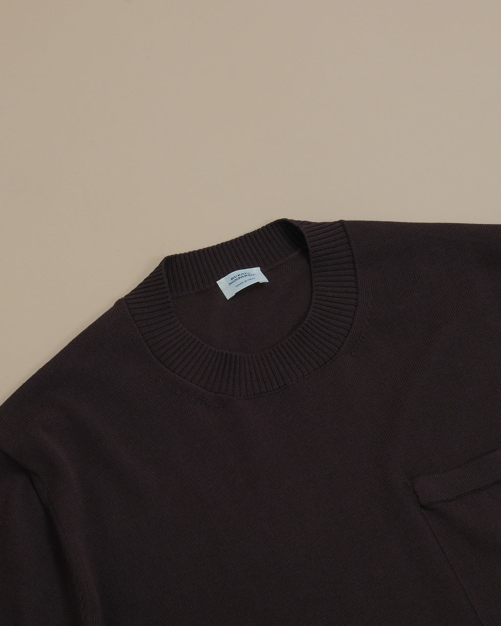 Detail of the ribbed crewneck on the Ebano Cotton Nonpareil T-Shirt by Rubato.