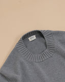 Detail of the ribbed neckline on the Grigio Nonpareil Heavy Crewneck by Rubato.