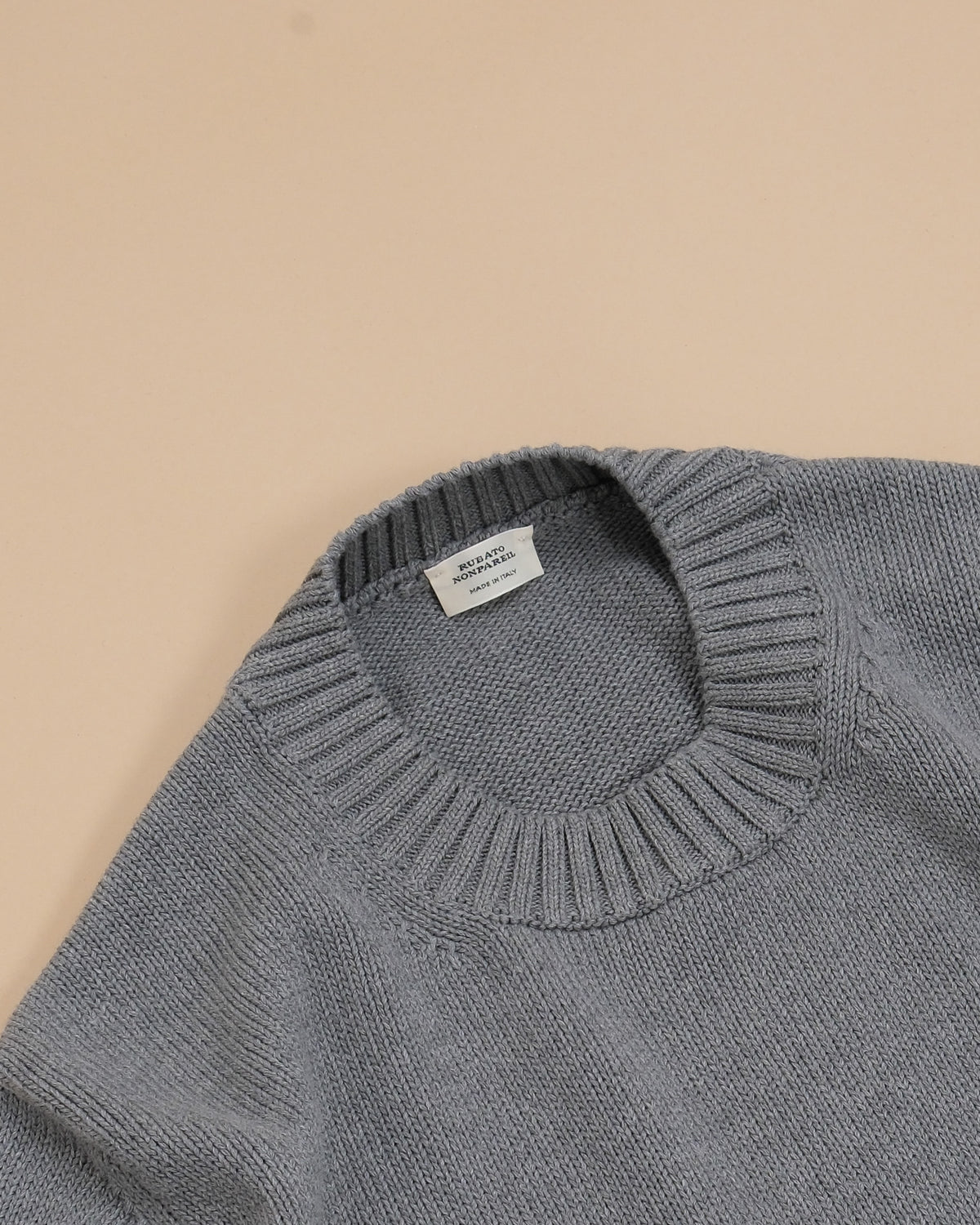 Detail of the ribbed neckline on the Grigio Nonpareil Heavy Crewneck by Rubato.