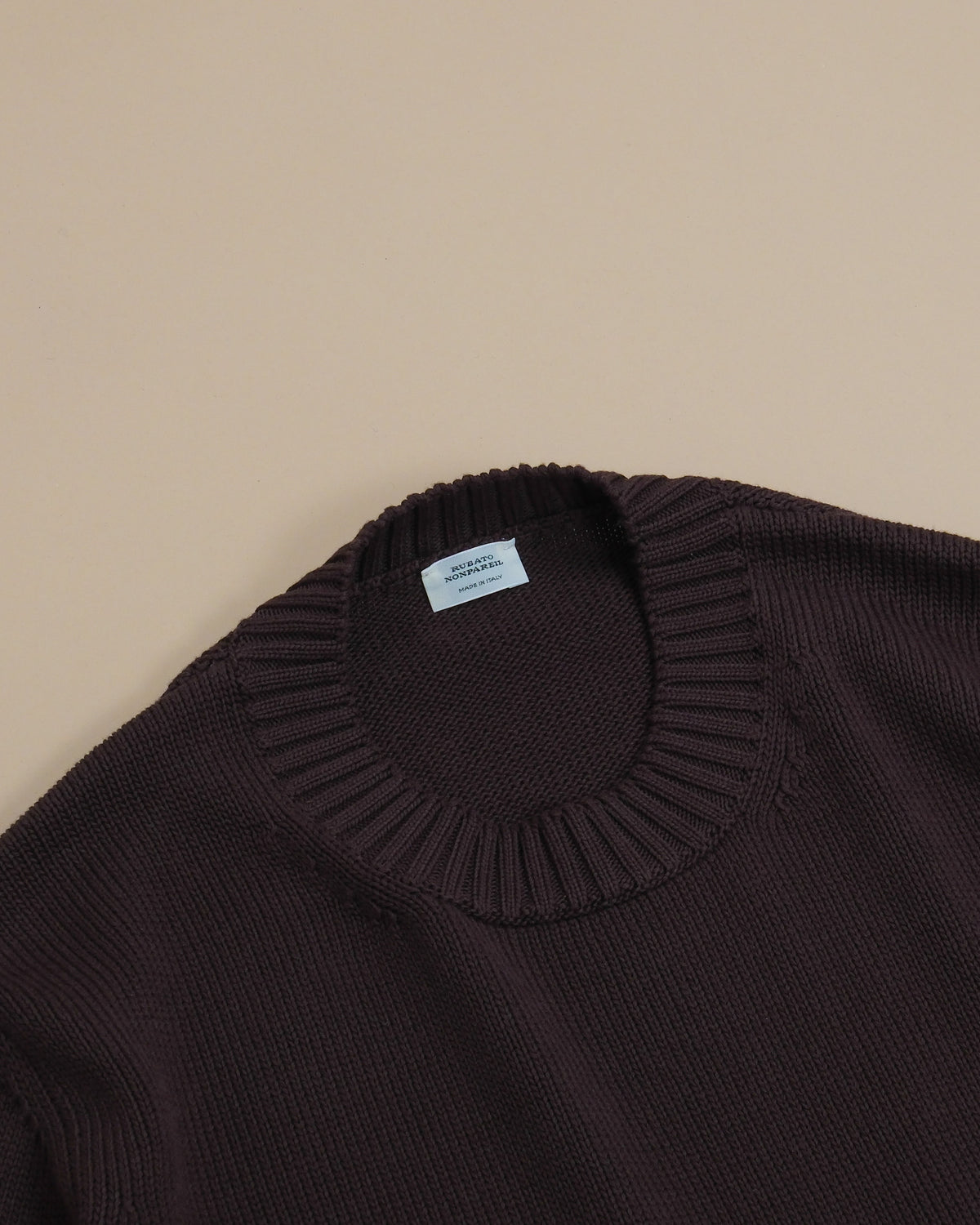 Detail of the ribbed crewneck on the Mocha Nonpareil Heavy Crewneck by Rubato