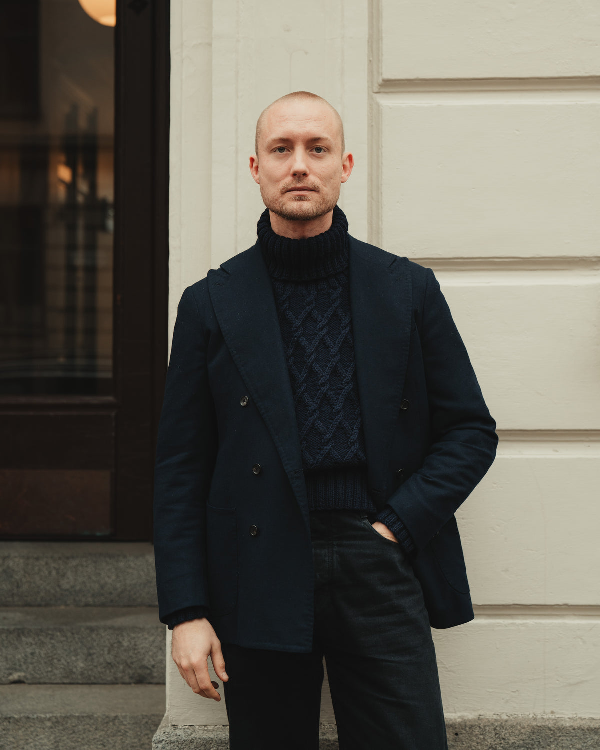 Daniel wears the Navy Hand-Knitted Mariner by Rubato.